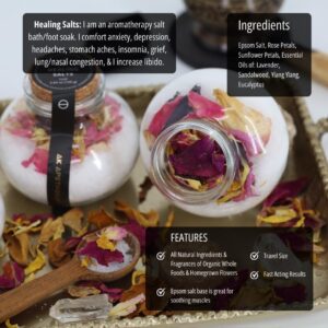 Two AK Apothecary Luxe Healing Salts in reusable jars, one corked and one uncorked, on a gold tray with dried flower petals around them and product info in text on the image.