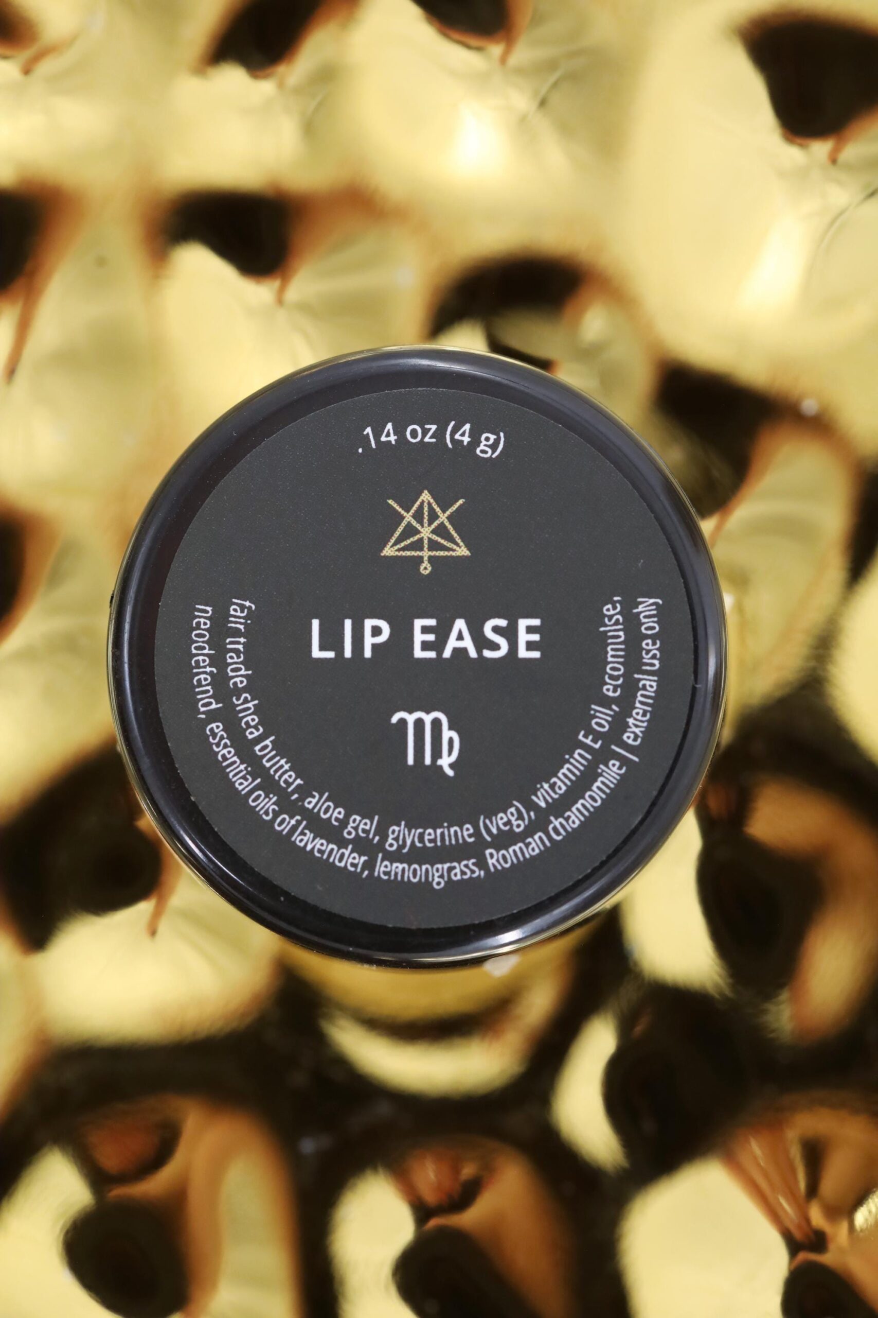 A small container of Lip Ease.